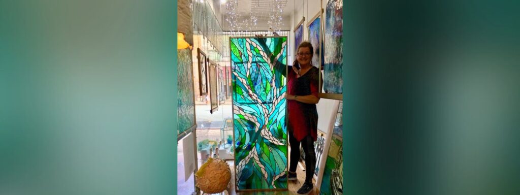 Michaele Rose holding finished panel