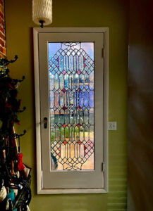 Beveled glass door with cranberry red diamonds