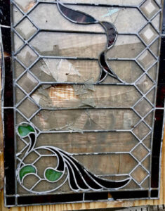 Damaged stained glass window