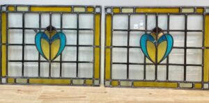 Two 1900s British stained glass panels