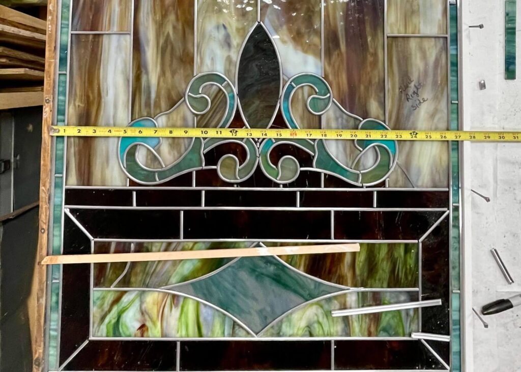 Stained glass panel completed and the original zinc frame it will fit into has been restored