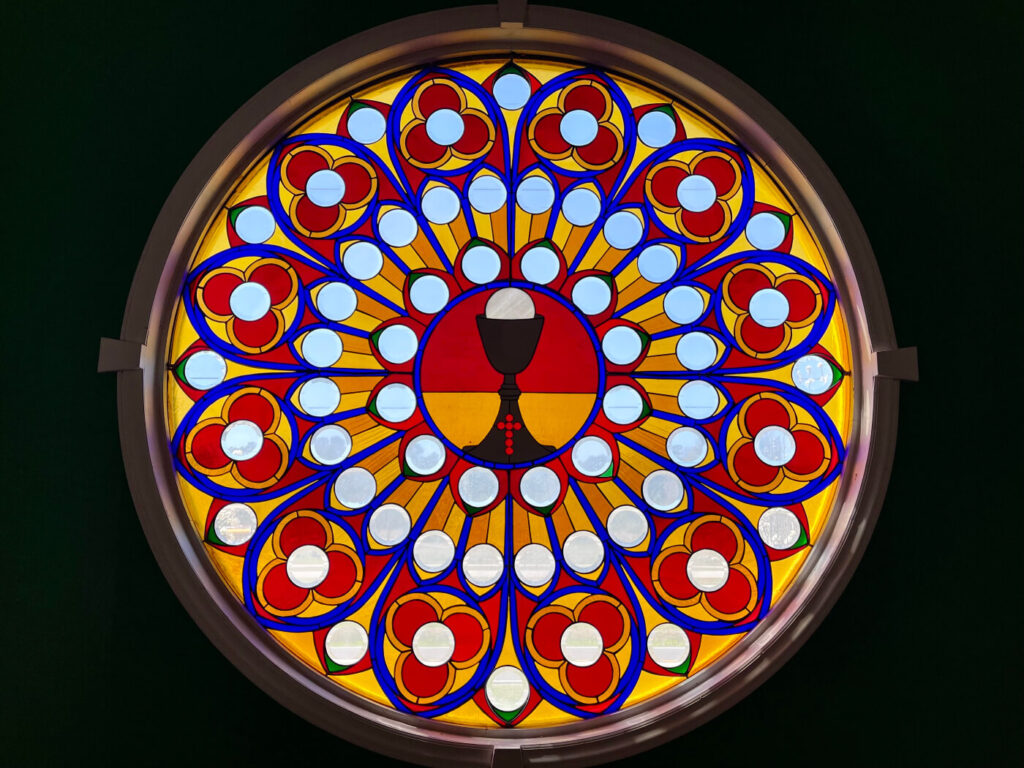 Close up of St Bartholomew Anglican round Rosetta Stained Glass Panel