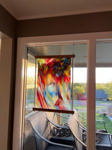 Art glass hung in window