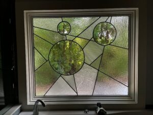 Closeup of stained glass bathroom window