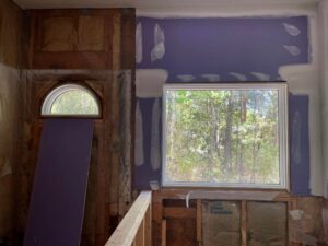 Bathroom window area prepped for stained glass window