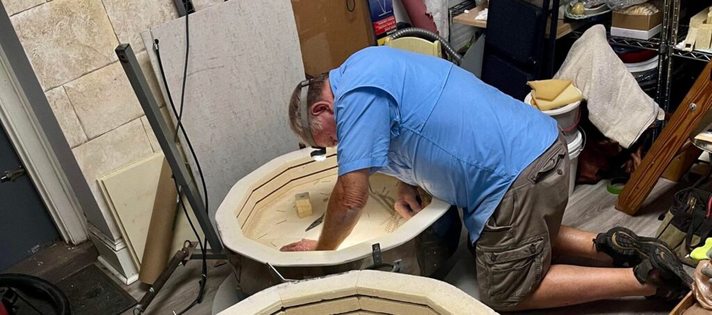 John inspecting inside old kiln