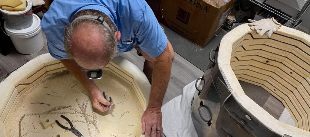 John on floor repairing kiln