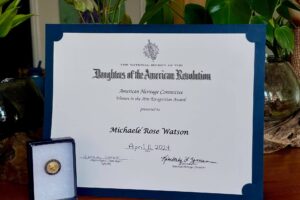 DAR award in frame on desk